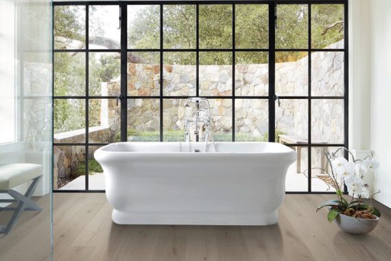 New at Carpet Plus! Karastan Luxury Laminate Flooring